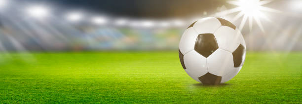 istock Soccer Ball in Spotlight 1124479811