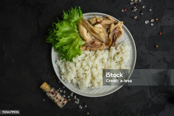 Rice And Boiled Chicken Meat Proper Nutrition Food Background Copy Space Stock Photo - Download Image Now