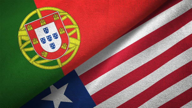 istock Liberia and Portugal two flags together textile cloth, fabric texture 1124480831