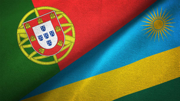 istock Rwanda and Portugal two flags together textile cloth, fabric texture 1124481820