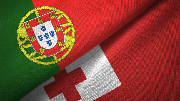 istock Tonga and Portugal two flags together textile cloth, fabric texture 1124482400