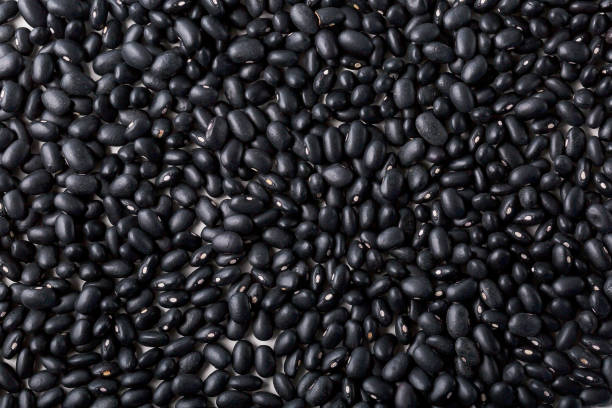 istock Top view of healthy grains black beans surface 1124483171