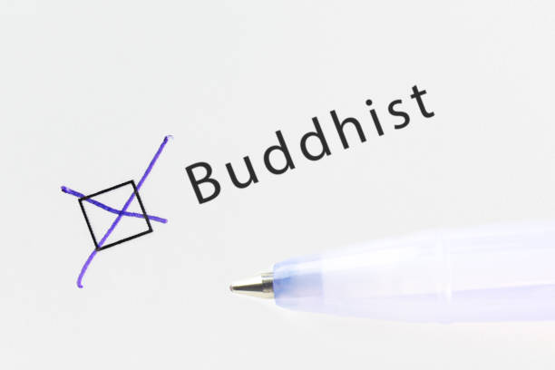 istock Buddhist - checkbox with a cross on white paper with blue pen. 1124485443