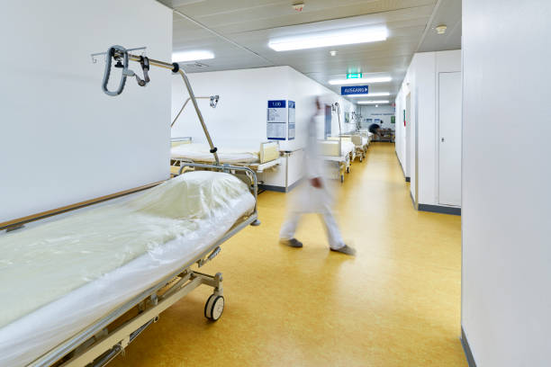 istock hospital bed doctor motion blur 1124486435