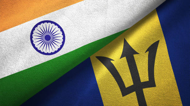 istock Barbados and India two flags together textile cloth, fabric texture 1124487034