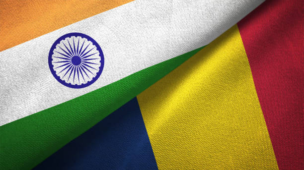 istock Chad and India two flags together textile cloth, fabric texture 1124487080
