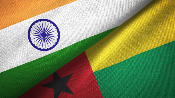istock Guinea-Bissau and India two flags together textile cloth, fabric texture 1124487665