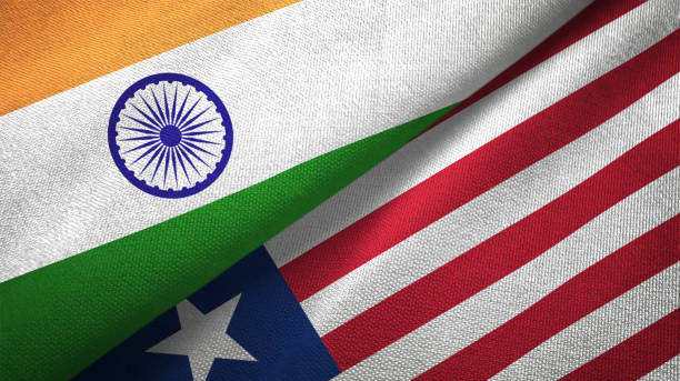 istock Liberia and India two flags together textile cloth, fabric texture 1124487720