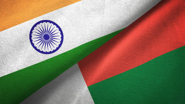 istock Madagascar and India two flags together textile cloth, fabric texture 1124487722