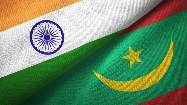 istock Mauritania and India two flags together textile cloth, fabric texture 1124487727