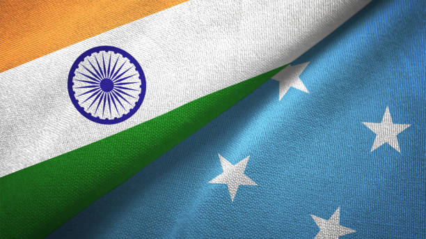 istock Micronesia and India two flags together textile cloth, fabric texture 1124487748