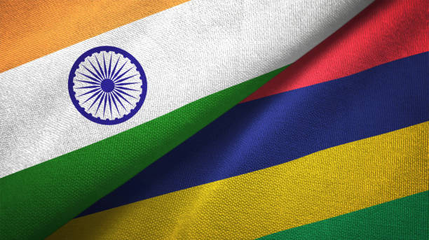istock Mauritius and India two flags together textile cloth, fabric texture 1124487760