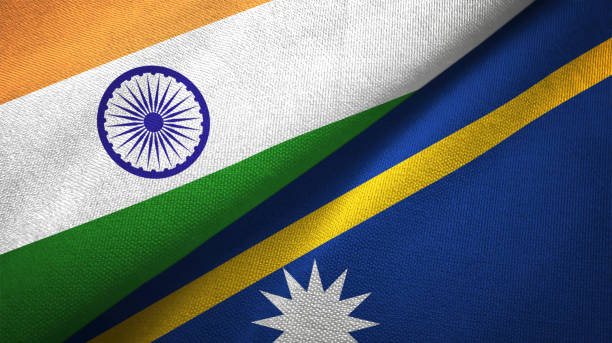 istock Nauru and India two flags together textile cloth, fabric texture 1124487786