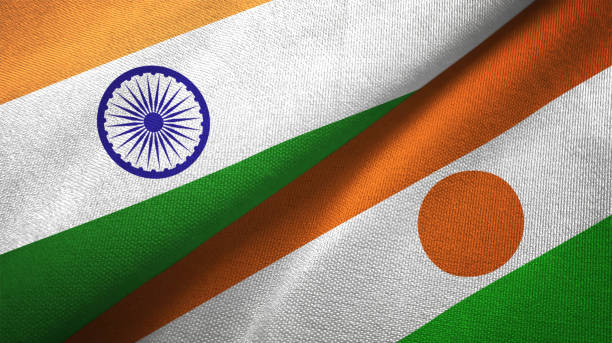 istock Niger and India two flags together textile cloth, fabric texture 1124487813