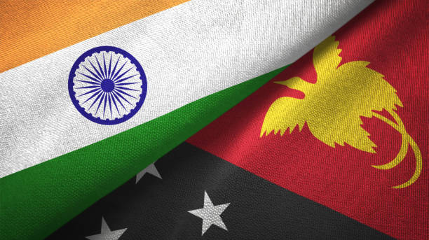 istock Papua New Guinea and India two flags together textile cloth, fabric texture 1124487859