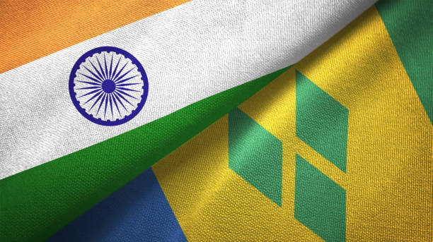 istock Saint Vincent and the Grenadines and India two flags together textile cloth, fabric texture 1124487892