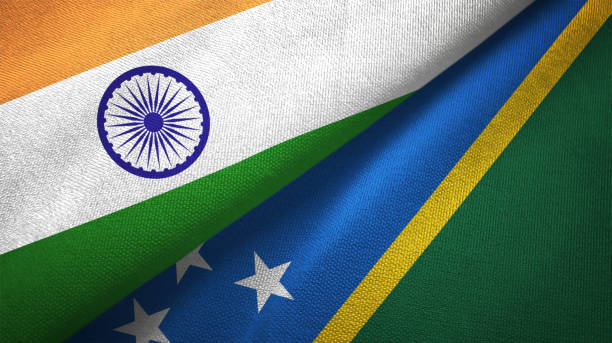 istock Solomon Islands and India two flags together textile cloth, fabric texture 1124487927