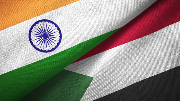 istock Sudan and India two flags together textile cloth, fabric texture 1124487953