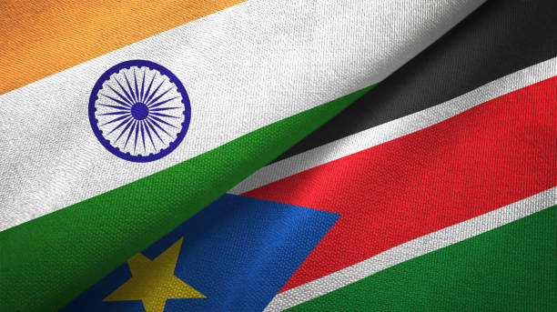 istock South Sudan and India two flags together textile cloth, fabric texture 1124487958