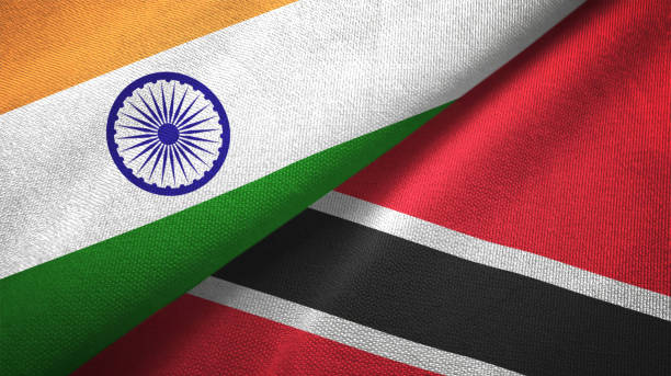 istock Trinidad and Tobago and India two flags together textile cloth, fabric texture 1124487985