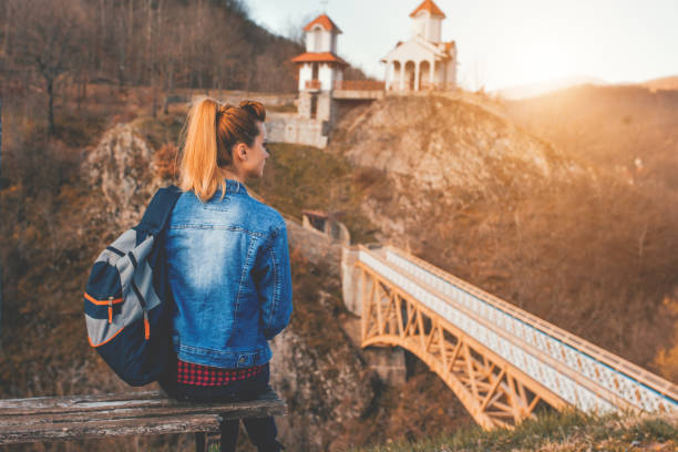 istock Female tourist traveling alone 1124488100