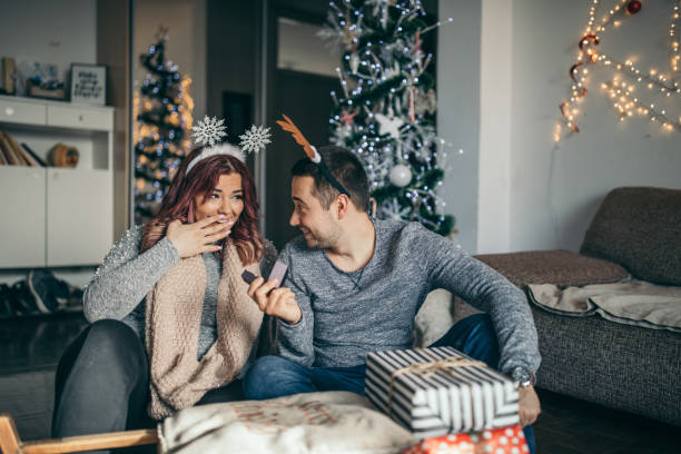 istock Young man is proposing to his girlfriend 1124488167