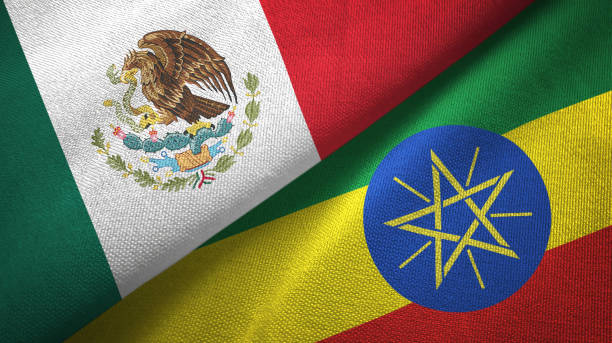 istock Ethiopia and Mexico two flags together textile cloth, fabric texture 1124489067