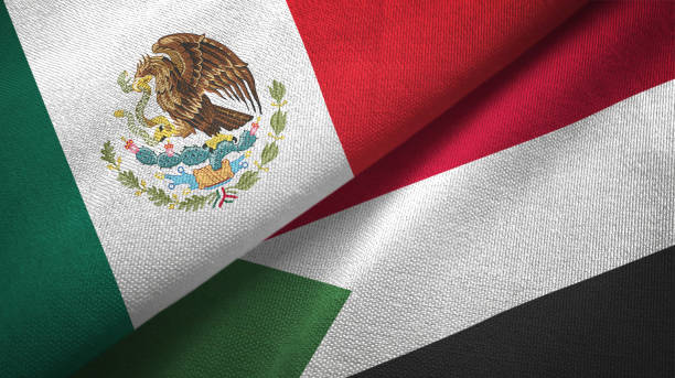 istock Sudan and Mexico two flags together textile cloth, fabric texture 1124489290