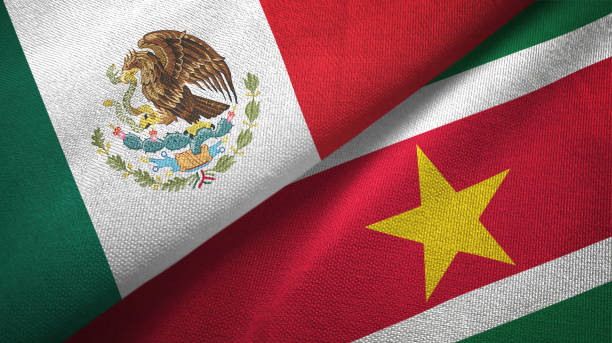 istock Suriname and Mexico two flags together textile cloth, fabric texture 1124489292