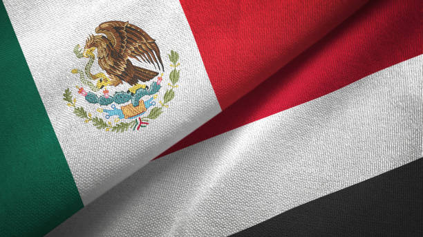 istock Yemen and Mexico two flags together textile cloth, fabric texture 1124489334