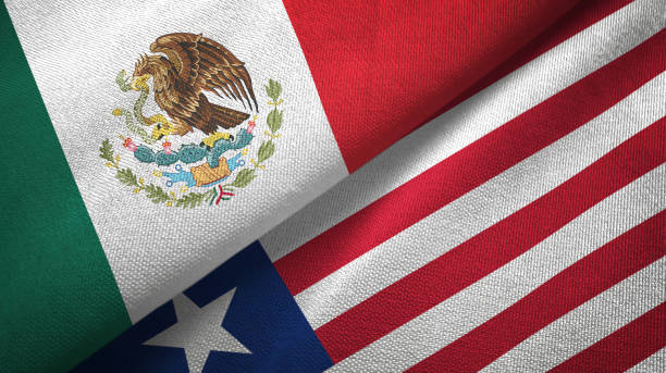 istock Liberia and Mexico two flags together textile cloth, fabric texture 1124489729
