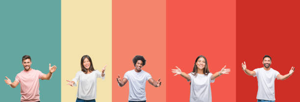 Collage of different ethnics young people over colorful stripes isolated background looking at the camera smiling with open arms for hug. Cheerful expression embracing happiness.
