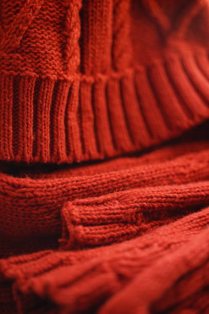 istock Cold winter clothing - knitted red hat and scarf 1124492741