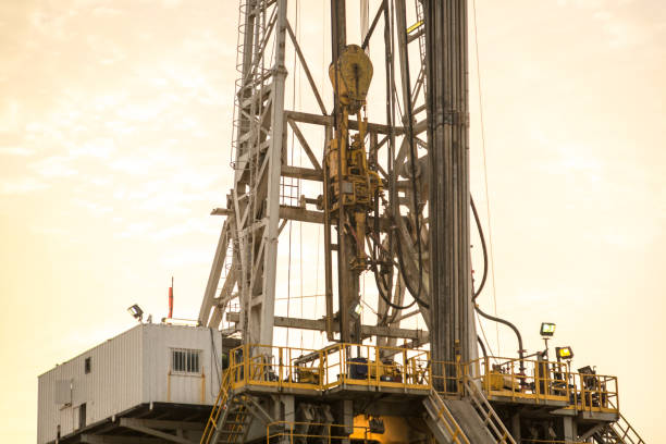 istock Oil drilling rig at dawn 1124496503