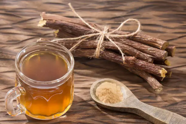 Licorice cup of tea, powder and roots - Glycyrrhiza glabra