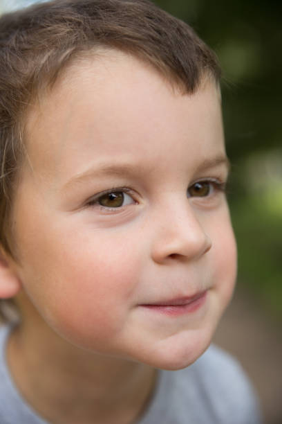 istock Close-up portrait smiling boy 1124499272