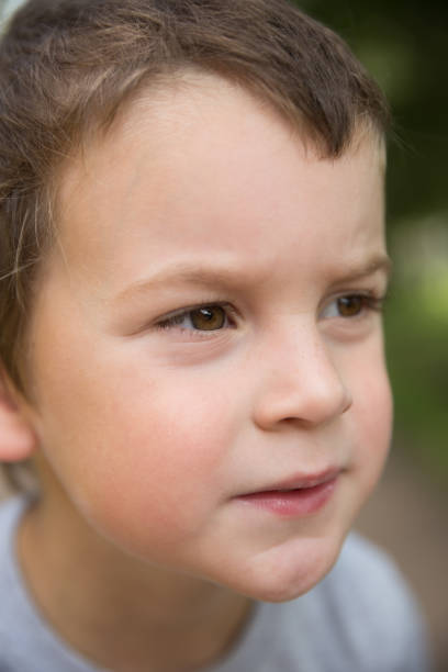 istock Close-up portrait serious boy 1124499277