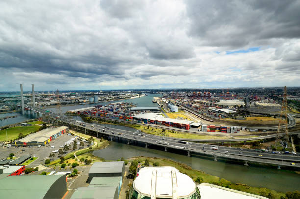 Melbourne, VIC, Australia - November 03, 2017: Aerial view to Bolte bridge, harbor and container shipping docks in Docklands district