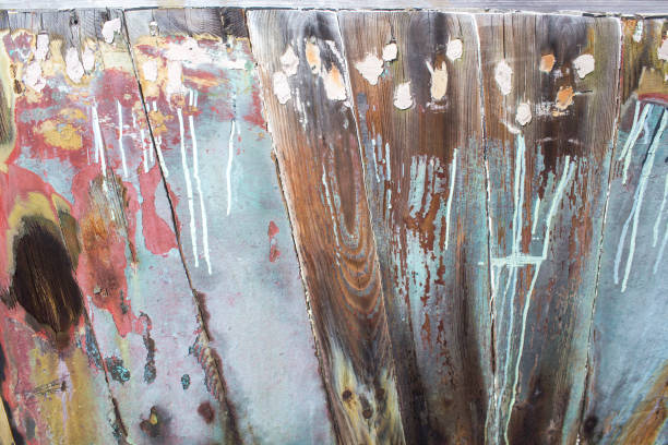 istock Colorful old boat hull with exposed wood grunge background 1124499362