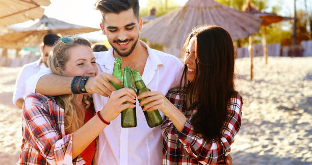 istock Friends partying and having fun on beach at summer 1124499406