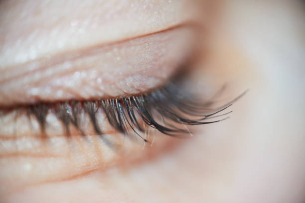 istock Closed Sad Woman Eye With Long Eyelashes Macro 1124499680