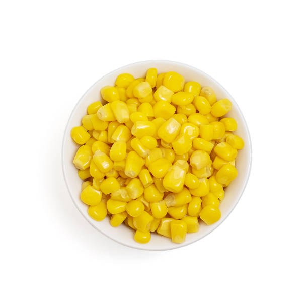 istock Bowl of sweet corn isolated on white background. top view 1124501193