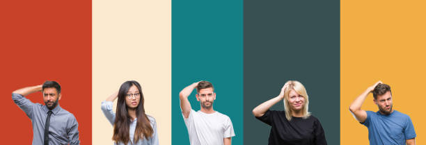 istock Collage of different ethnics young people over colorful stripes isolated background confuse and wonder about question. Uncertain with doubt, thinking with hand on head. Pensive concept. 1124503386