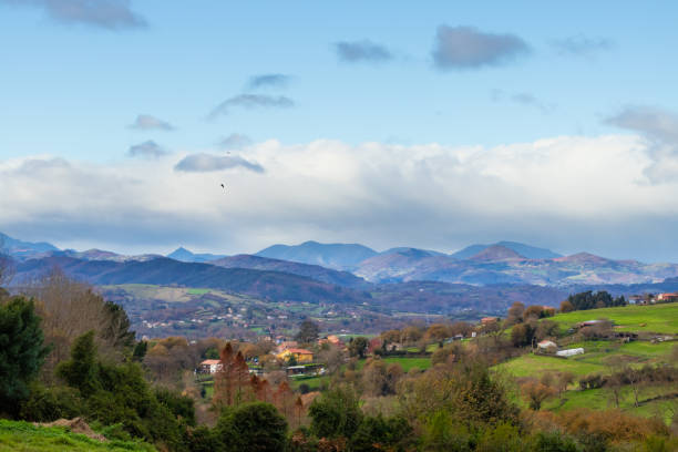 istock Mountain range in clear weather in contrasting rain clouds before the rain 1124507654