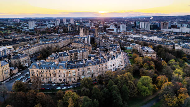 Golden Hour in Glasgow's Kelvingrove Park Aerial photography of Glasgow's west end with views of Kelvingrove Park, Glasgow University, Kelvingrove Art Gallery, Finneston, SECC, SEE Hydro, Park Circus, River Kelvin and The Clyde. glasgow scotland stock pictures, royalty-free photos & images