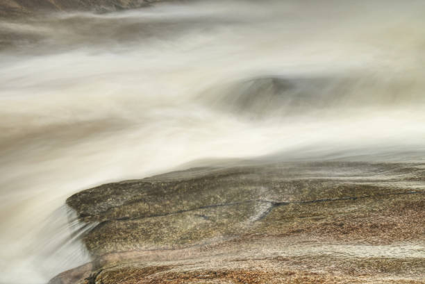 istock Cascade of waterfall on rocks. Winter Mumlava river 1124509701