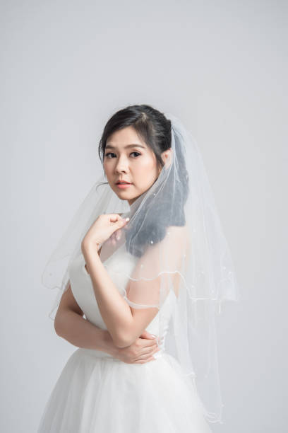 istock Beautiful Asian bride with veil 1124509982