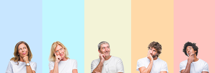 Collage of group of young and middle age people wearing white t-shirt over color isolated background with hand on chin thinking about question, pensive expression. Smiling with thoughtful face. Doubt concept.