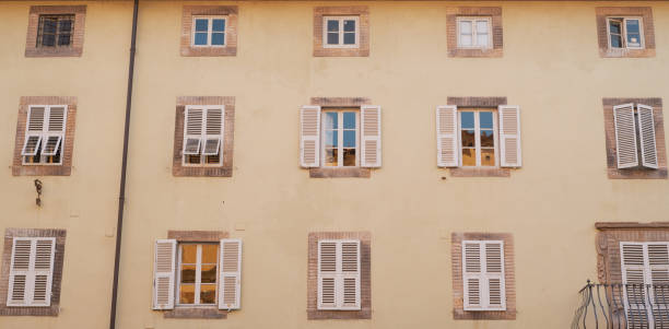 istock panoramic view of a beautiful classic ancient residential building in Lucca 1124511350