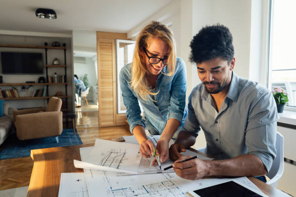 istock Architect colleagues working in office 1124516386